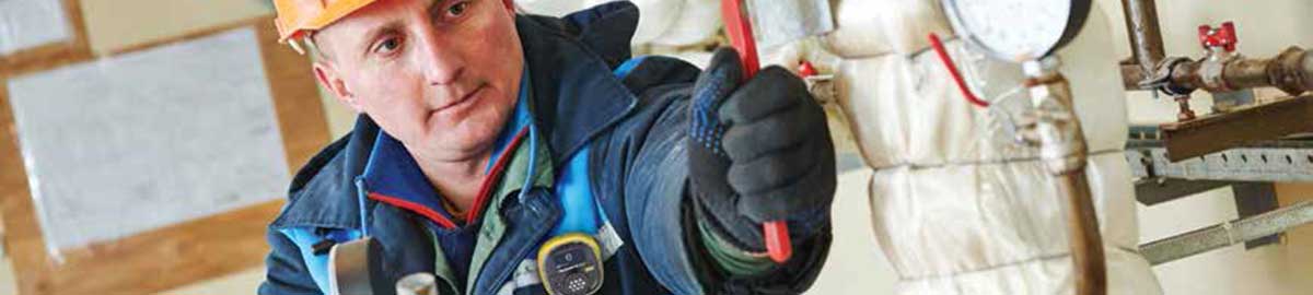 Worker with Solo Detector clipped to front of jacket